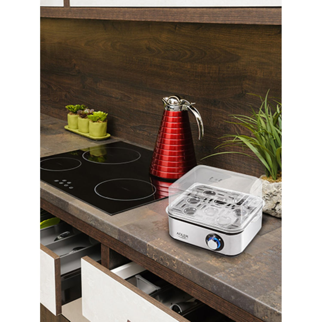 Adler Elektrischer Eierkocher | 1-8 Eier | Elektronische Härtegradeinstellung | Edelstahlheizplatte | Inklusive Messbecher mit Eierpiker | 500 Watt